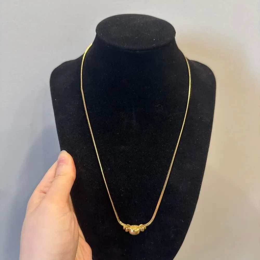 Source Unknown gold tone